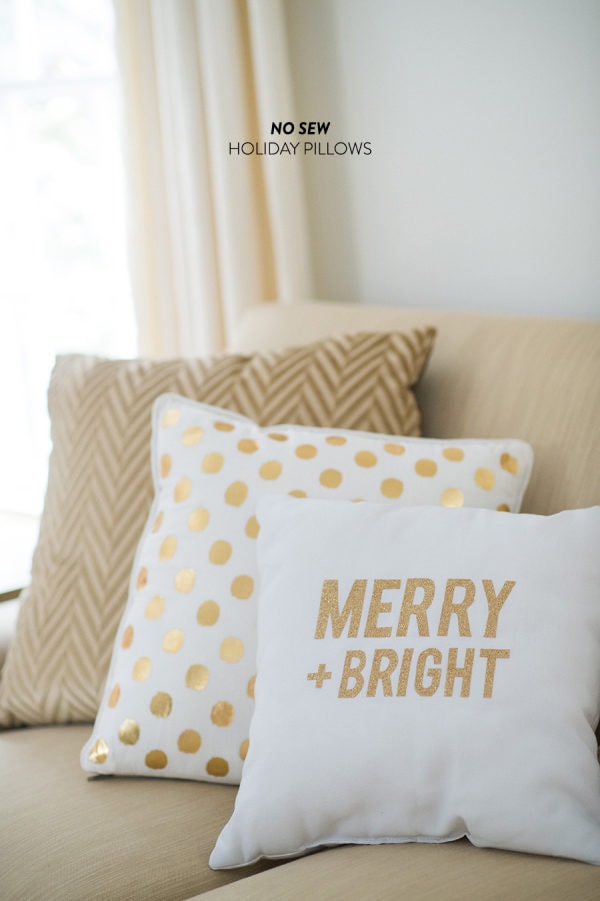 White and golden holiday pillows.