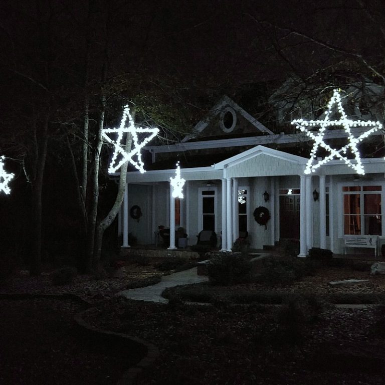 Wooden stars for outdoor Christmas decor.