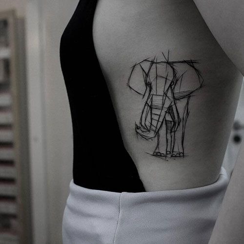 Amazing elephant outline tattoo.