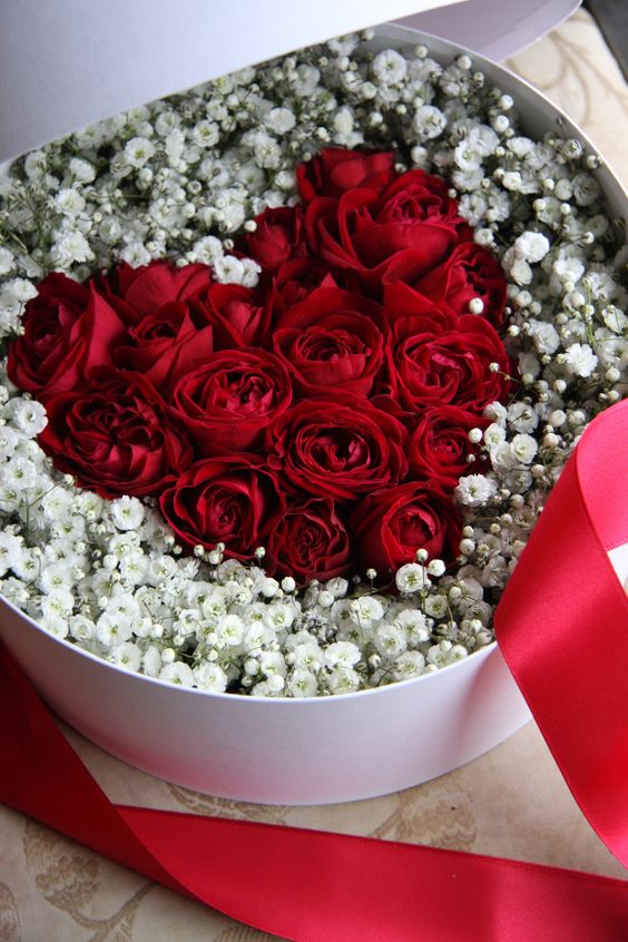 Beautiful red heart roses in a box.