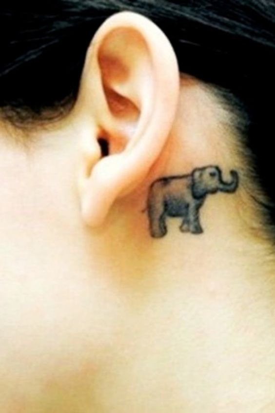 Behind the ear elephant tattoo.