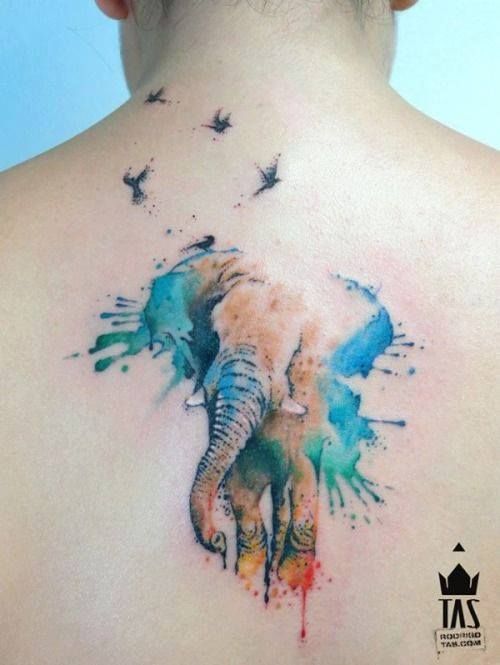 Dazzling water color elephant tattoo on back.