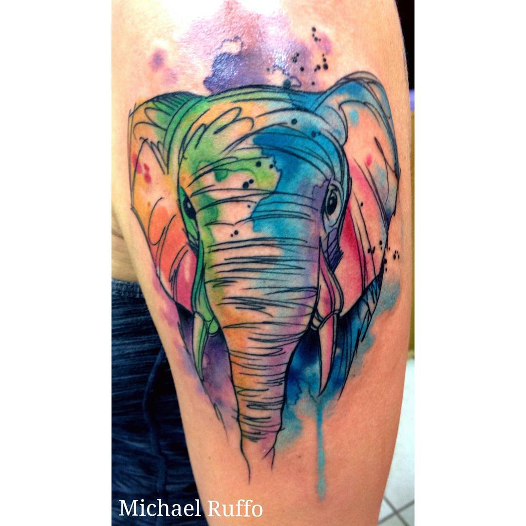 Fabulous watercolor elephant tattoo.