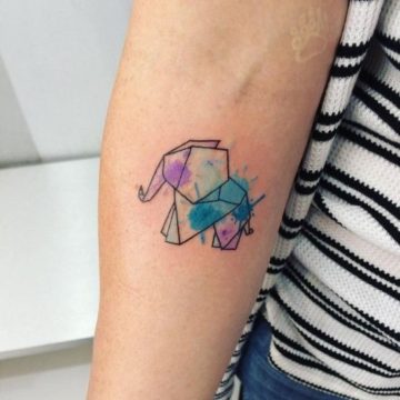 Fantastic watercolor small elephant tattoo on wrist.