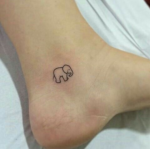 Fineline elephant tattoo on ankle.