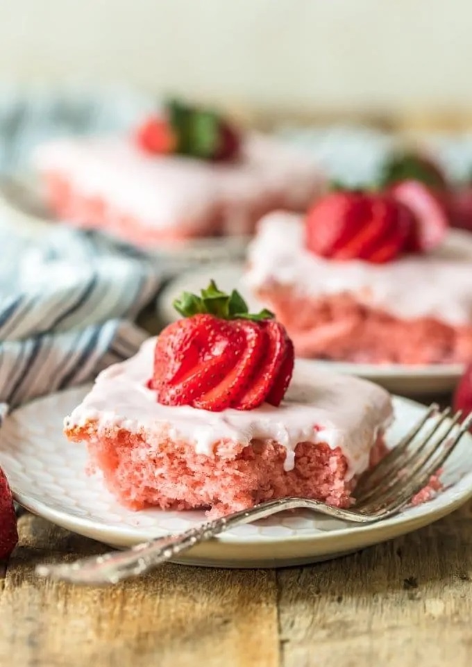 Fresh strawberry cake with strawberry cream cheese icing.