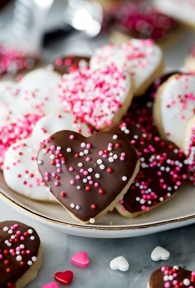Perfect Valentines day dessert dipped in white chocolate and sprinkled with nonpareils.