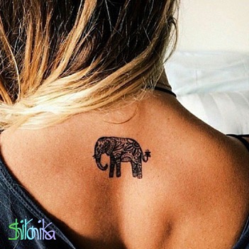 Pretty elephant tattoo on back.