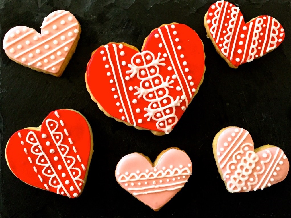 Red & pink heart cutout cookies.