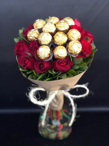 Red roses with chocolate bouquet.