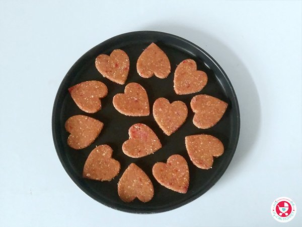Strawberry heart shaped sugar cookies.