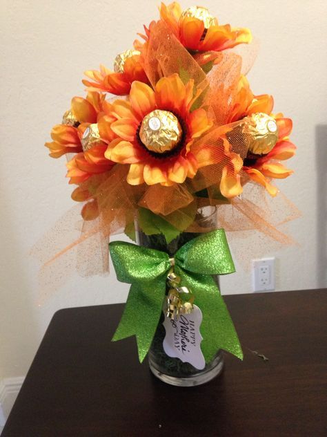 Sunflower bouquet with chocolate.