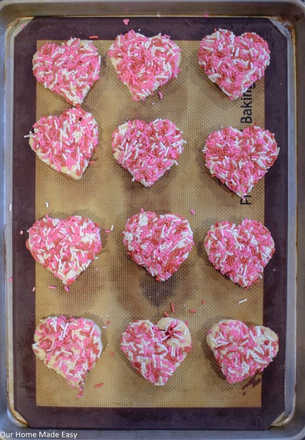 Valentines day sprinkled cookies.