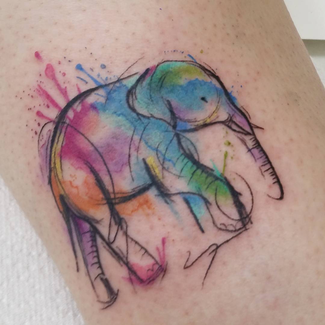 Watercolor elephant tattoo.