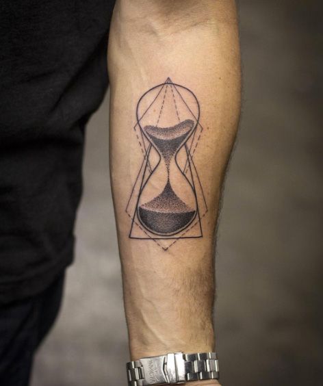 Abstract hourglass tattoo on forearm.