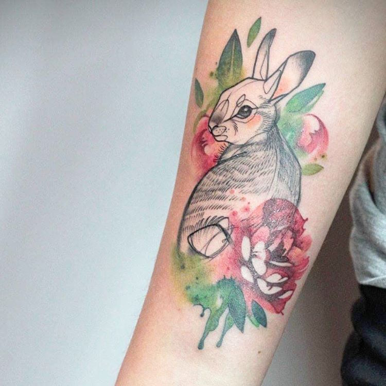 Adorable water color bunny tattoo.