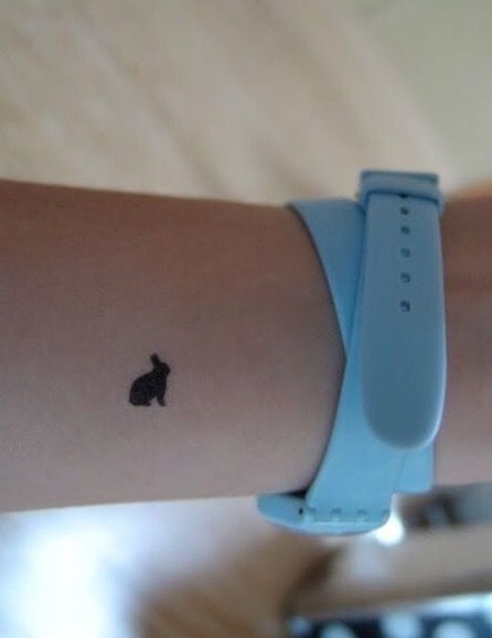 Amazing bunny tattoo on wrist.