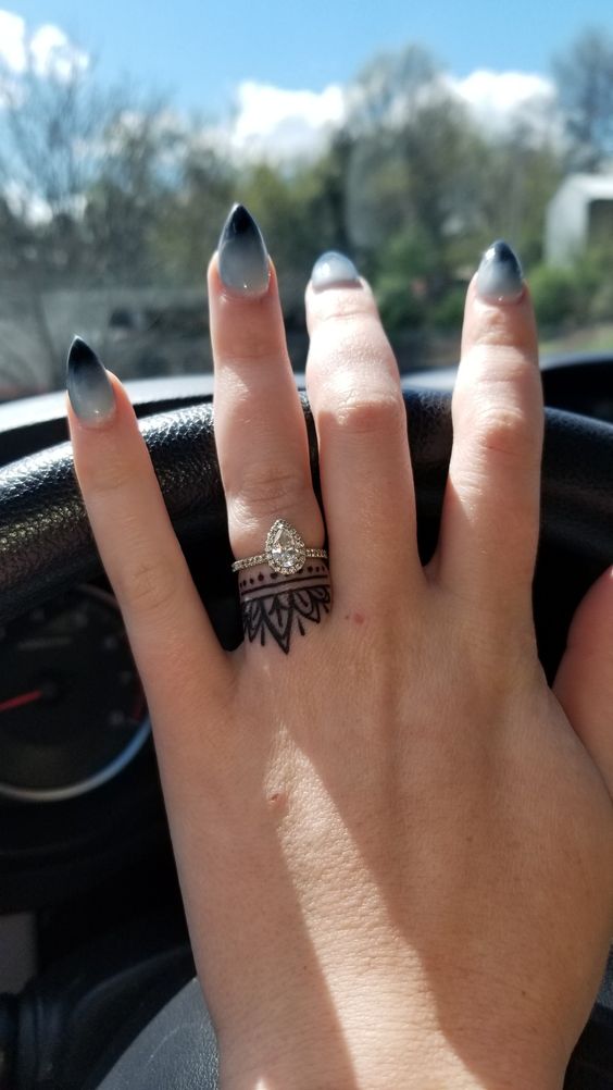 Amazing wedding ring tattoo idea.