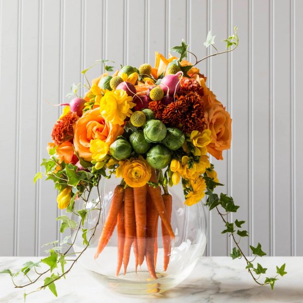 Beautiful vegetable and floral centerpiece.