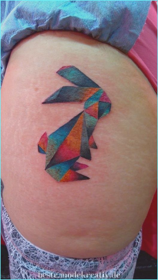 Colorful geometric bunny tattoo for Easter.