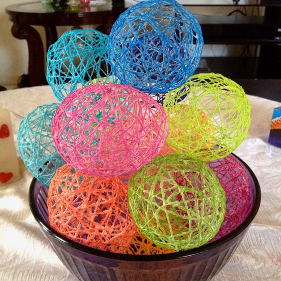 Colorful yarn Easter egg centerpiece.