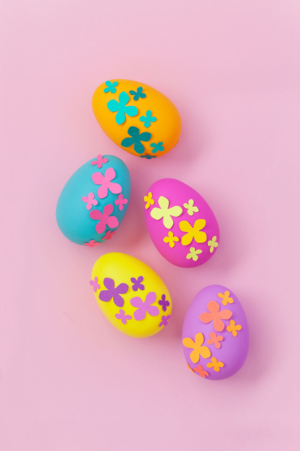 Eggs decorated with paper flowers.