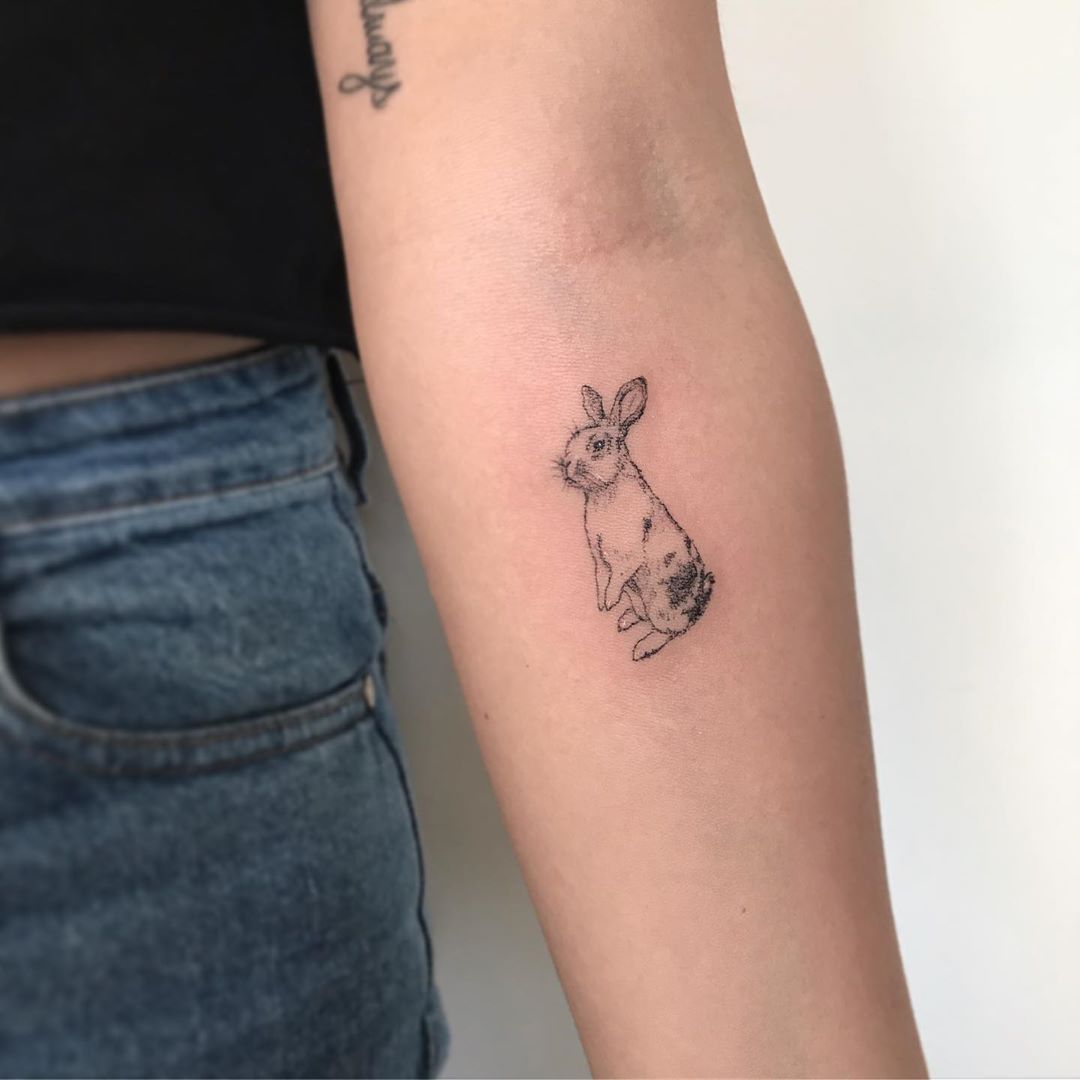 Fabulous bunny tattoo on arm.