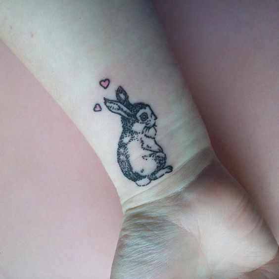 Fantastic bunny tattoo on wrist.