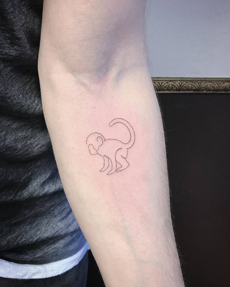 Fineline baby monkey tattoo.