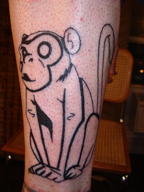 Incredible line work monkey tattoo.