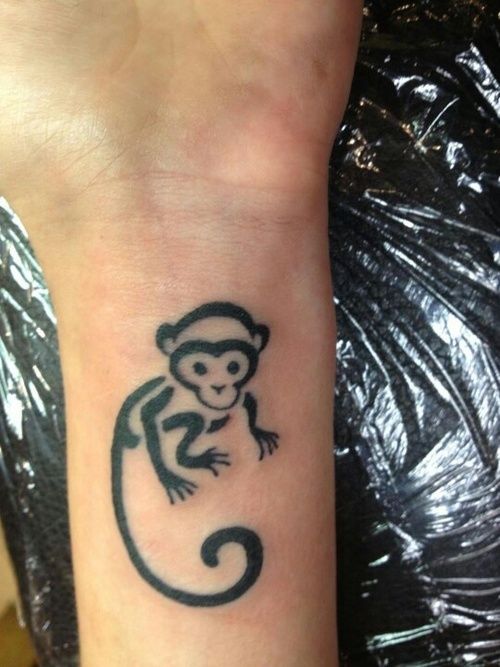 Love this monkey tattoo inked on wrist.
