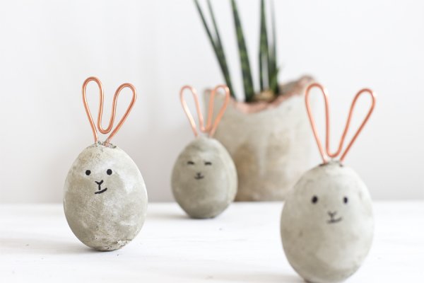 Lovely concrete and copper bunnies Easter bunnies.
