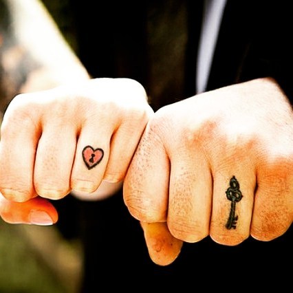 Lovely heart and key tattoos.