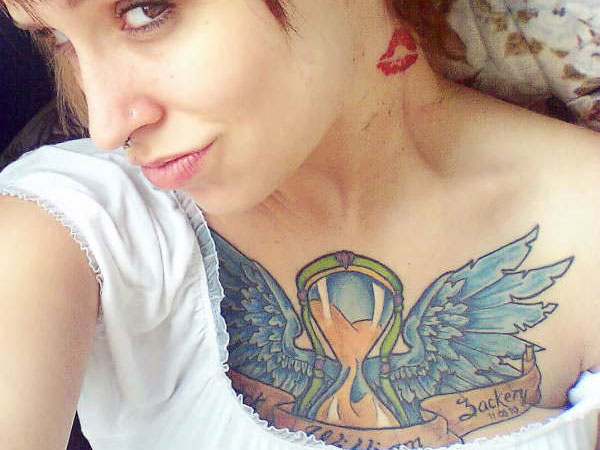 Nice chest piece with blue wings around the hourglass.