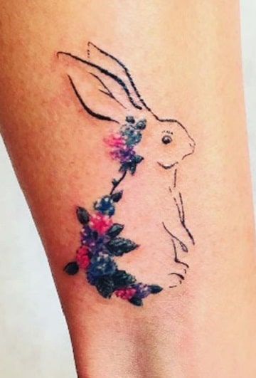 Outline bunny with flowers.