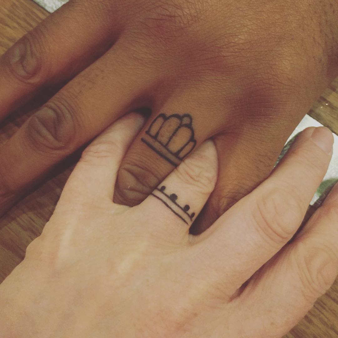 Perfect king and queen wedding tattoo.