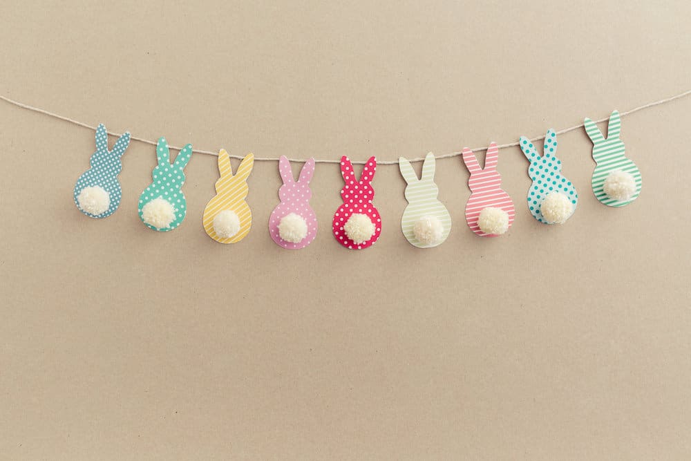 Polka dots & striped pom-pom bunny tail Easter garland.