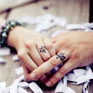 Wedding ring design tattoo idea.