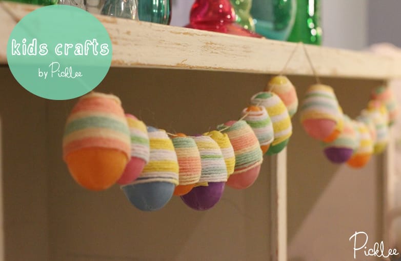 Yarn wrapped egg garland for Easter.