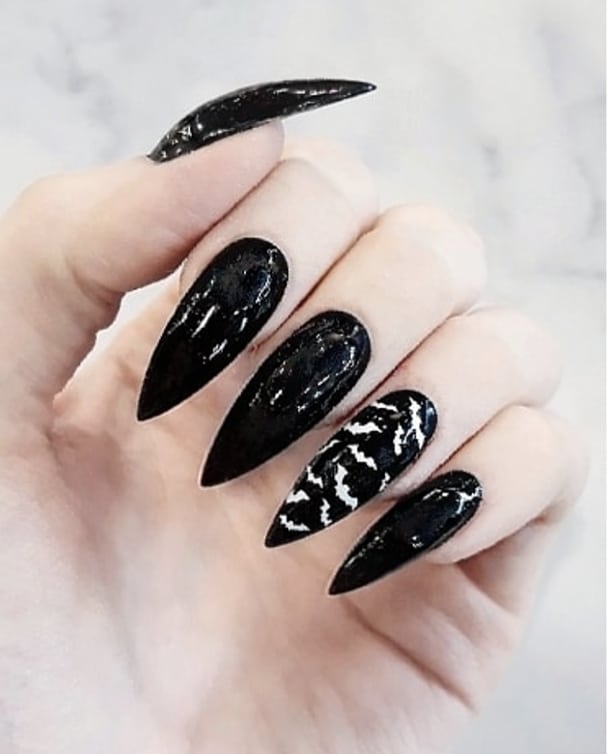 Black gel stiletto bat nails. Pic by xdemidoomx