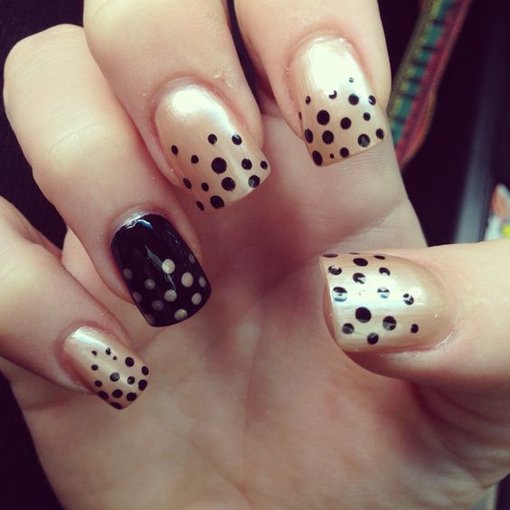 Almond Nails With Black Polka Dots On Light Base