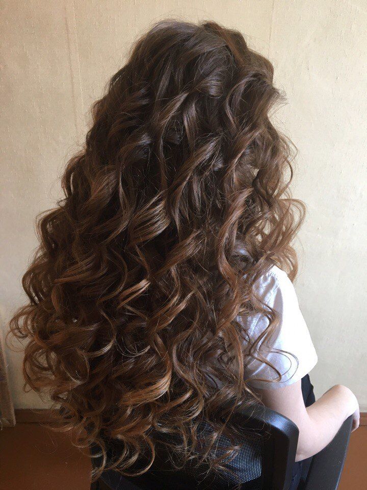 Curly Side Swept Cardinal Color Hair Style